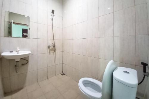 joy guesthouse pekanbaru mitra reddoorz