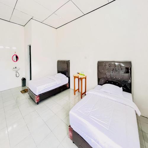 Kempu Tigan Homestay Berastagi Mitra Reddoorz,,2 star