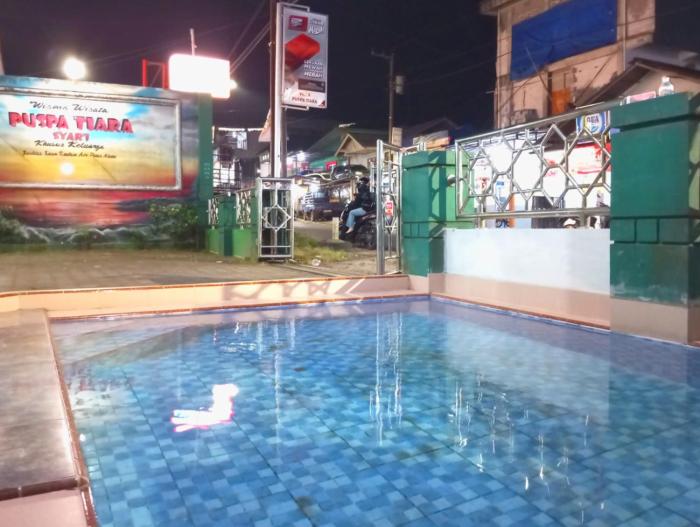 puspa tiara syari guci mitra reddoorz