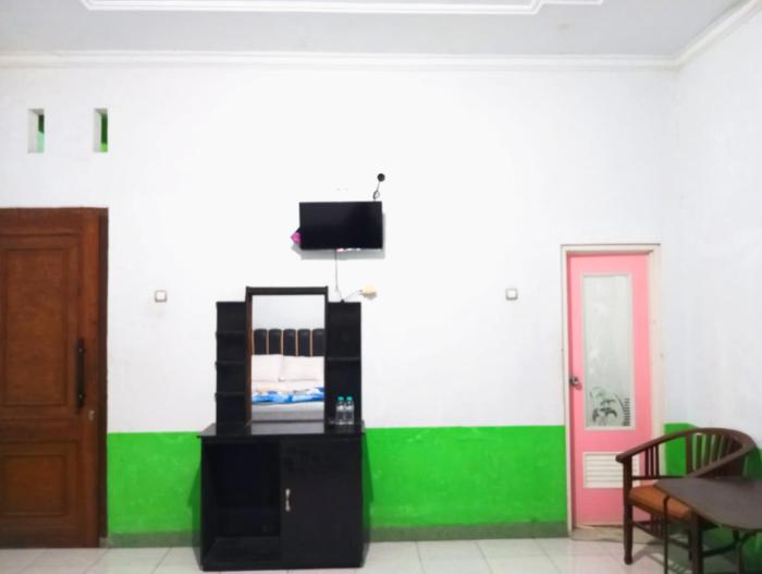puspa tiara syari guci mitra reddoorz