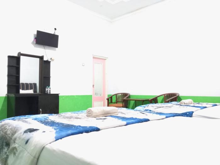 puspa tiara syari guci mitra reddoorz