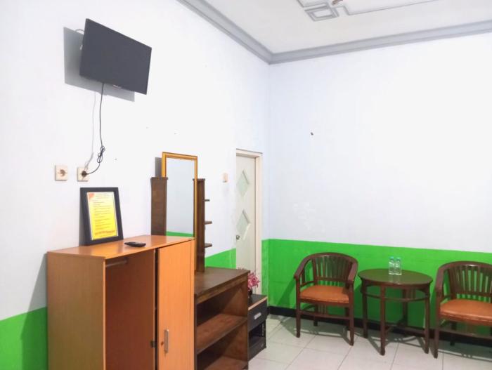 puspa tiara syari guci mitra reddoorz