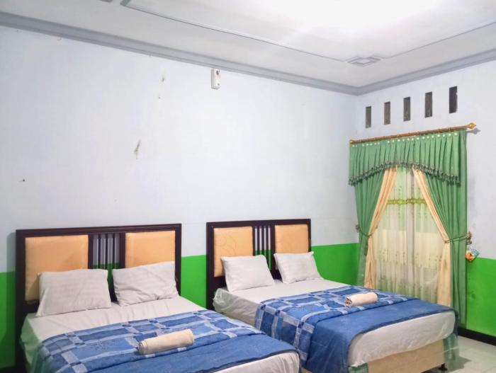 puspa tiara syari guci mitra reddoorz