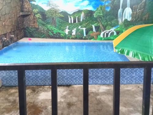 puspa tiara syari guci mitra reddoorz