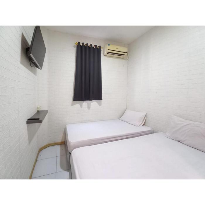 reddoorz luxury homestay near aloha waru surabaya