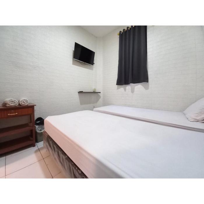 reddoorz luxury homestay near aloha waru surabaya