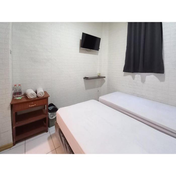 reddoorz luxury homestay near aloha waru surabaya