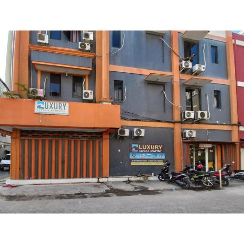 reddoorz luxury homestay near aloha waru surabaya