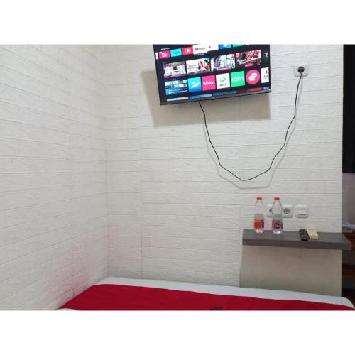 reddoorz luxury homestay near aloha waru surabaya
