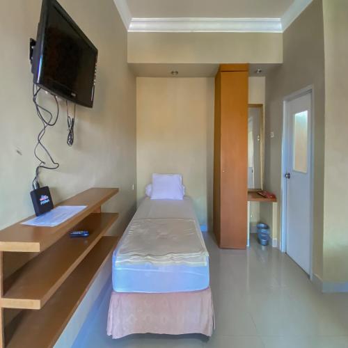 reddoorz near taman bunga nusantara