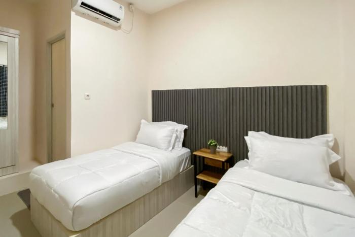 reddoorz syariah near rs awal bros panam pekanbaru