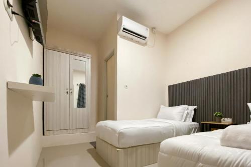 reddoorz syariah near rs awal bros panam pekanbaru
