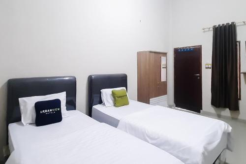 urbanview hotel fira syariah muara enim by reddoorz