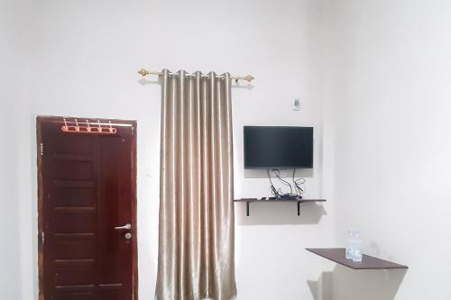 urbanview hotel fira syariah muara enim by reddoorz