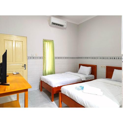 wisma mekar jaya near solo safari mitra reddoorz