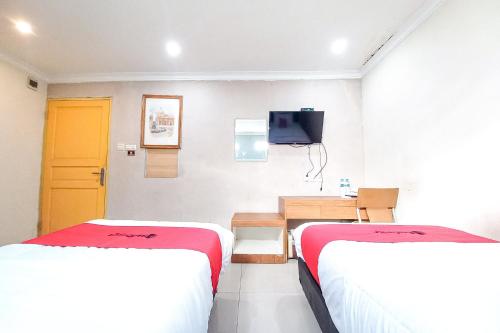 reddoorz hotel baaraka near living world