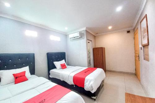 reddoorz hotel baaraka near living world