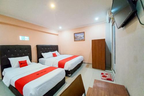 reddoorz hotel baaraka near living world