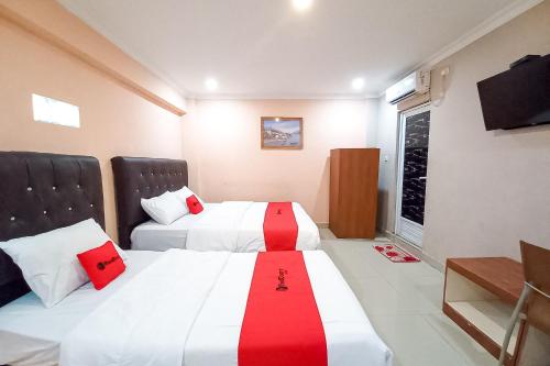 reddoorz hotel baaraka near living world