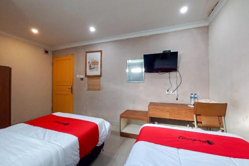 reddoorz hotel baaraka near living world