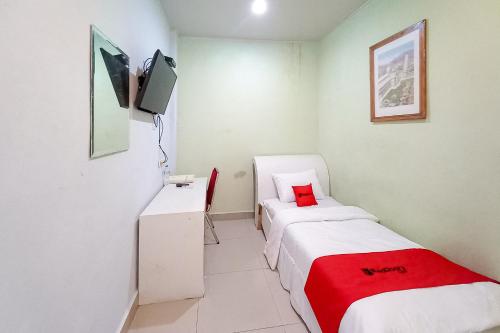 reddoorz hotel baaraka near living world