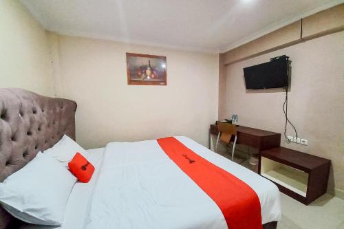 reddoorz hotel baaraka near living world