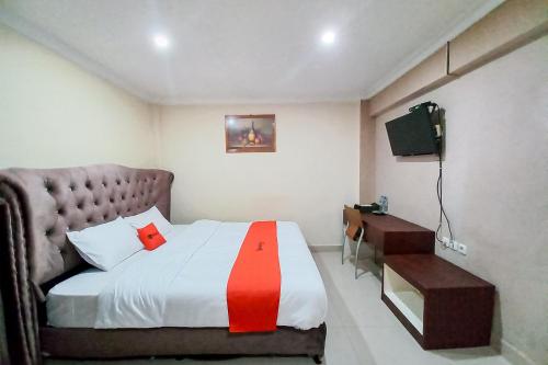 reddoorz hotel baaraka near living world