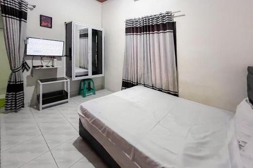 kostel 99 pangkal pinang redpartner