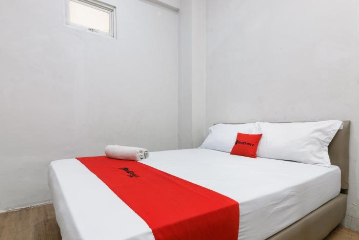 reddoorz near mandaya royal hospital puri