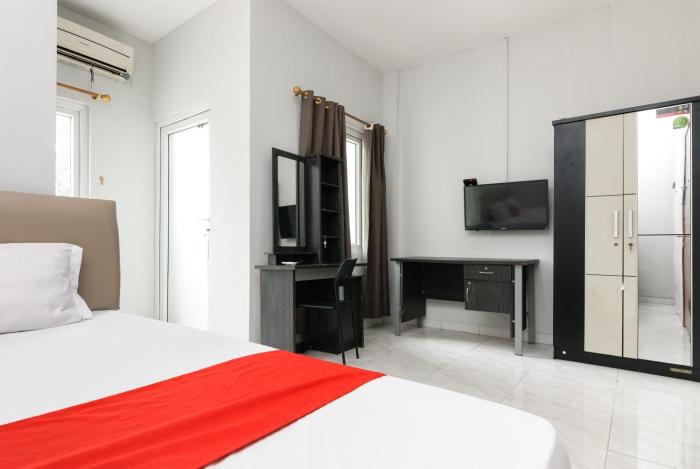 reddoorz near mandaya royal hospital puri