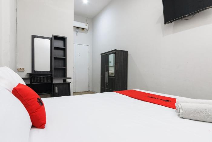 reddoorz near mandaya royal hospital puri