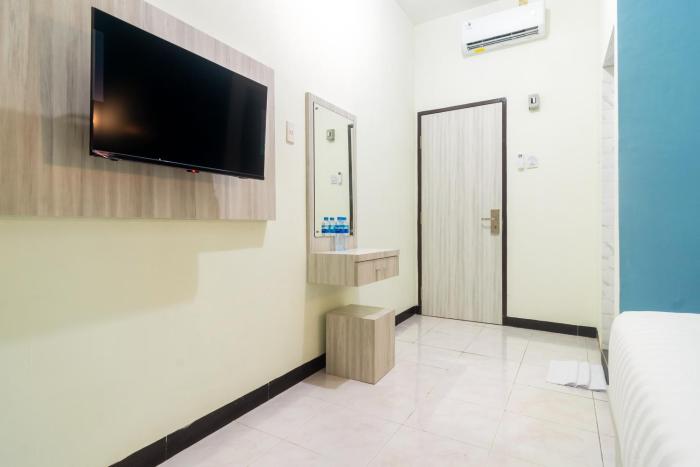 reddoorz plus sempurna inn medan