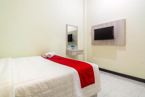 reddoorz plus sempurna inn medan