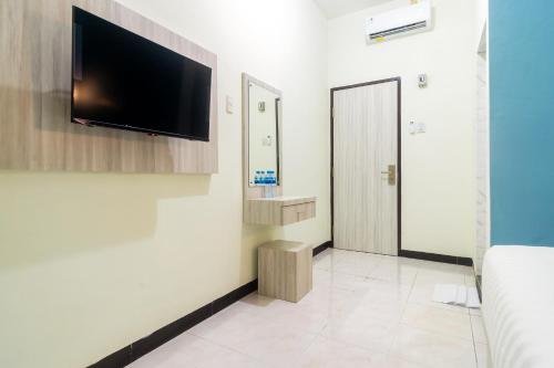 reddoorz plus sempurna inn medan