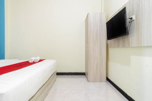 reddoorz plus sempurna inn medan