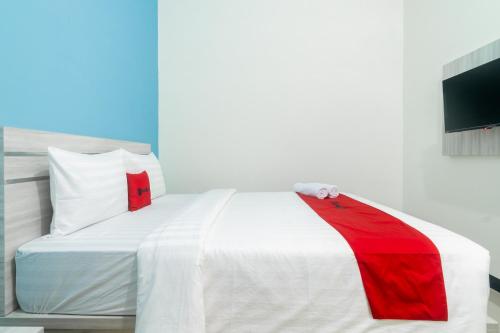reddoorz plus sempurna inn medan