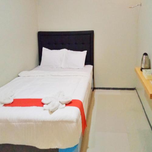 rifal inn mitra reddoorz