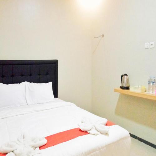 rifal inn mitra reddoorz