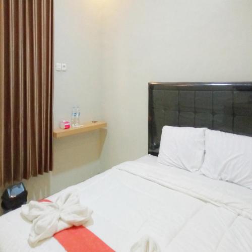 rifal inn mitra reddoorz