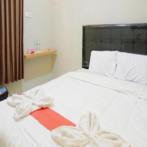 rifal inn mitra reddoorz