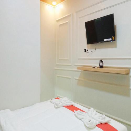 rifal inn mitra reddoorz