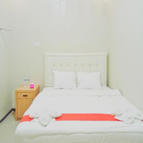 rifal inn mitra reddoorz