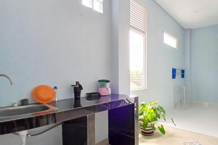 priyanka guesthouse syariah maguwo mitra reddoorz