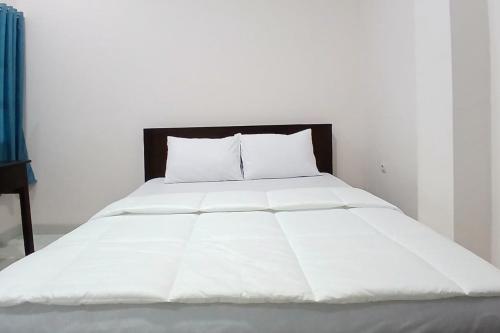 priyanka guesthouse syariah maguwo mitra reddoorz