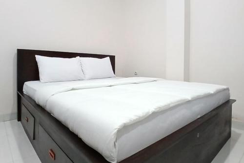 priyanka guesthouse syariah maguwo mitra reddoorz
