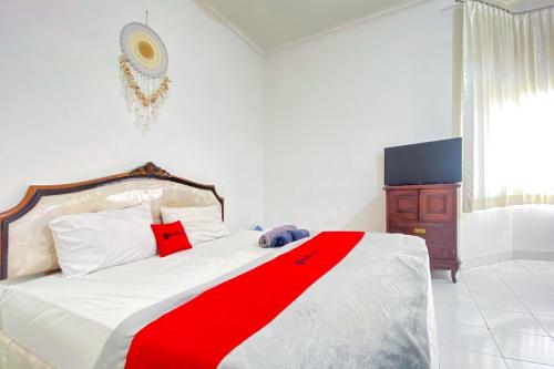 reddoorz near taman bunga nusantara 2