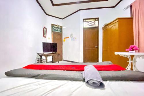 reddoorz near taman bunga nusantara 2