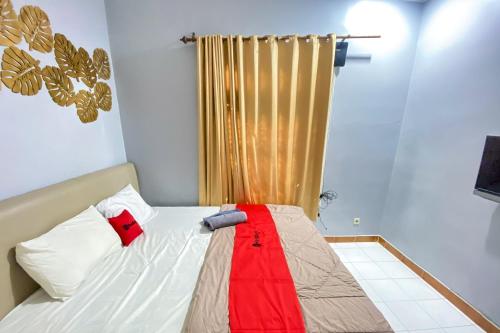 reddoorz near taman bunga nusantara 2