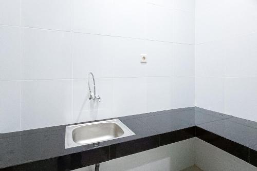 widi guest house near gwk mitra reddoorz