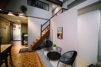 swing and pillows at 87 chulia st